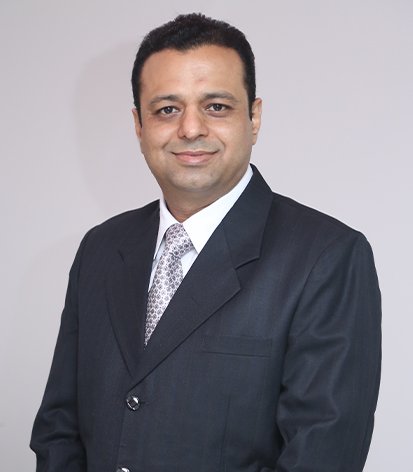 Dr. Manish Dhawan